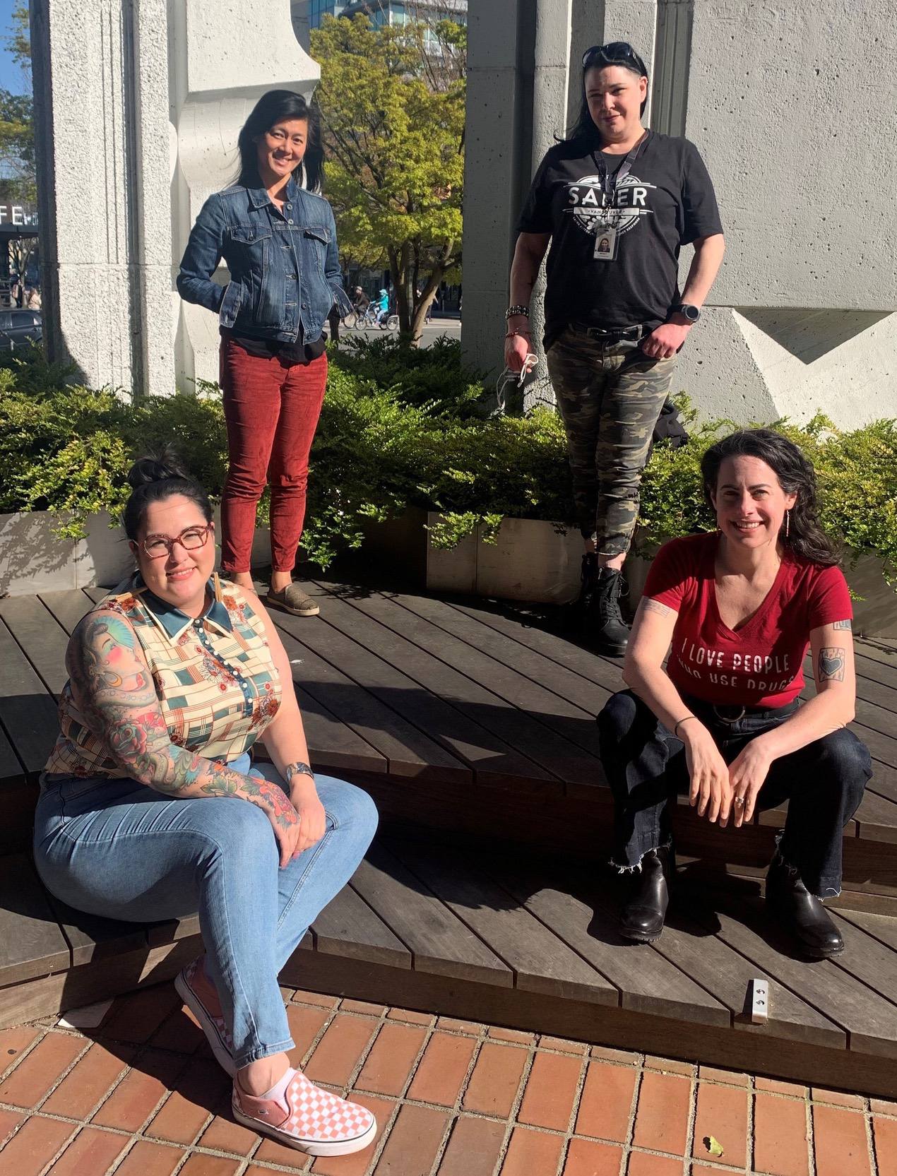 The SUPP Team, sitting outside, smiling